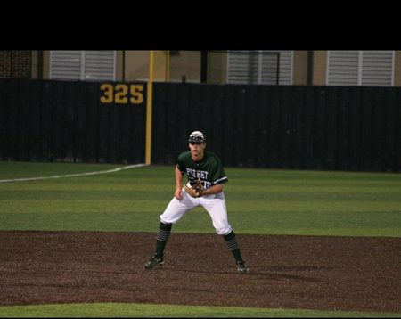 Trevor at third base for Poteet.