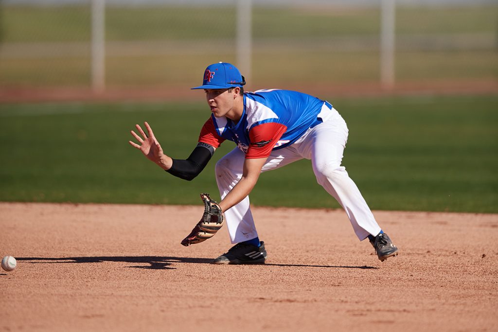 Mase fielding a groundball during the 2018 Under Armour All-America Pre-Season Tournament